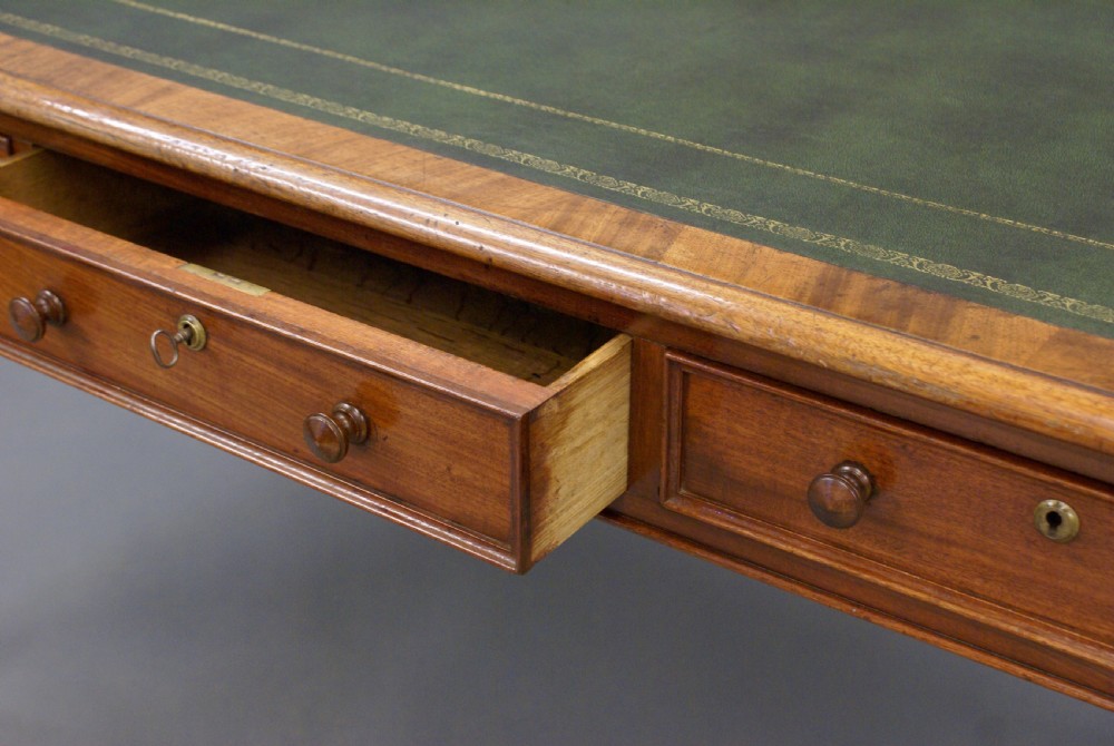 A mid-19th C mahogany, partners writing table View VI