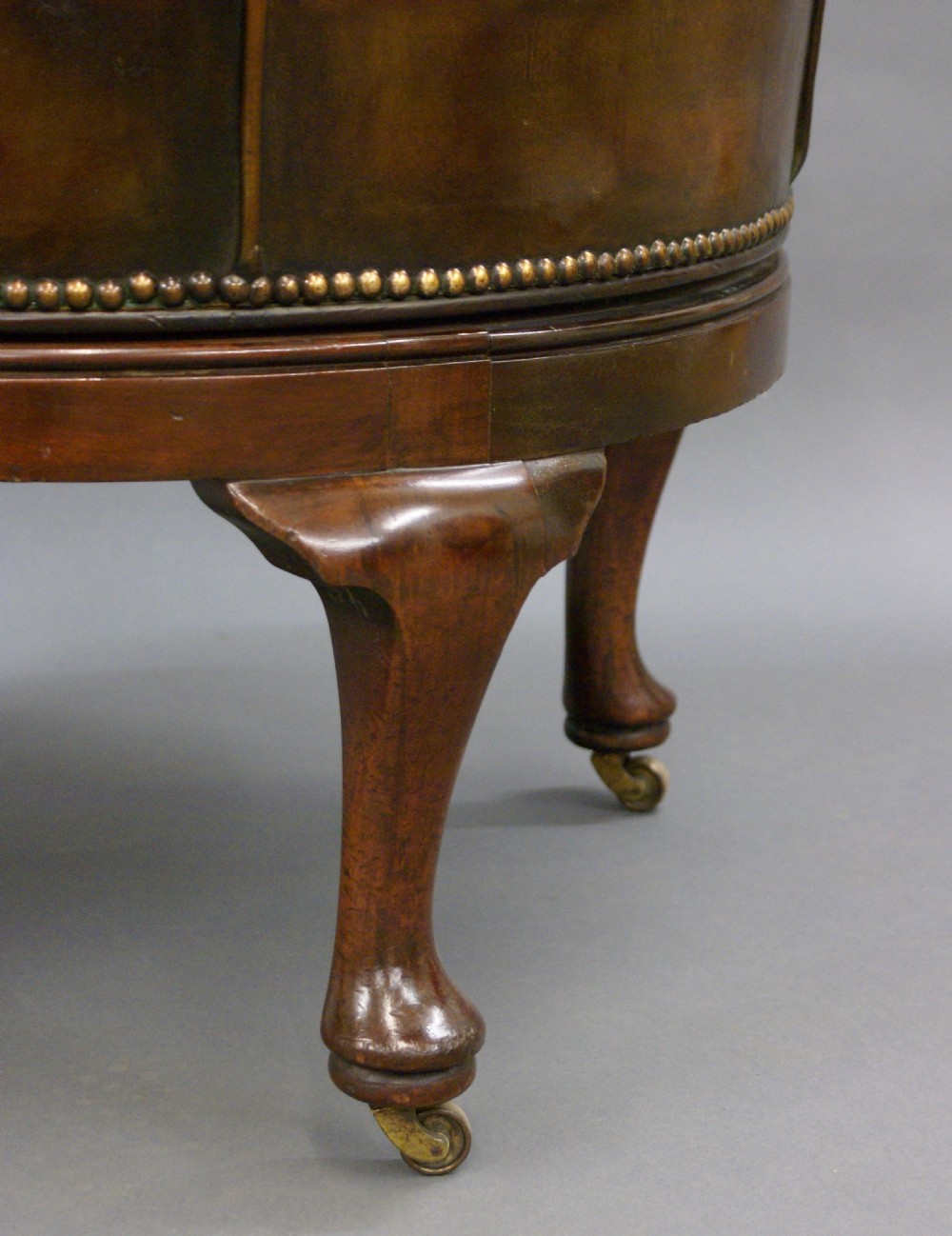 A revolving mahogany & leather desk chair View IV