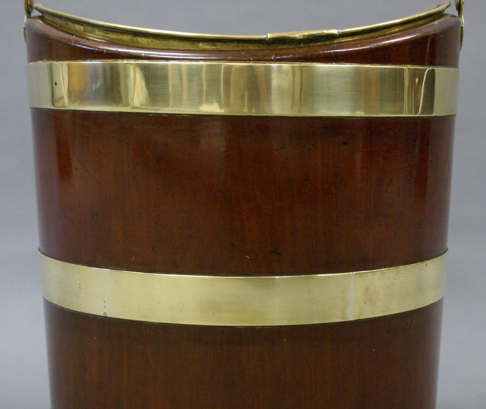A Dutch mahogany and brass bucket View V