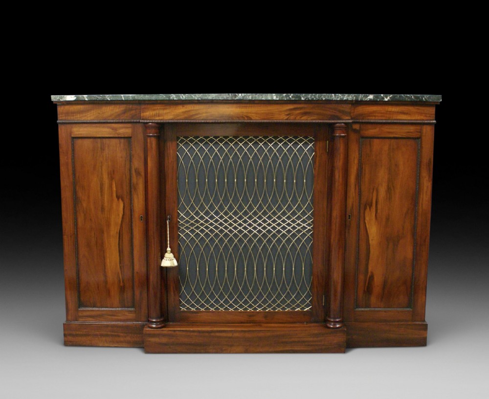 A William IV goncalo alves break front cabinet