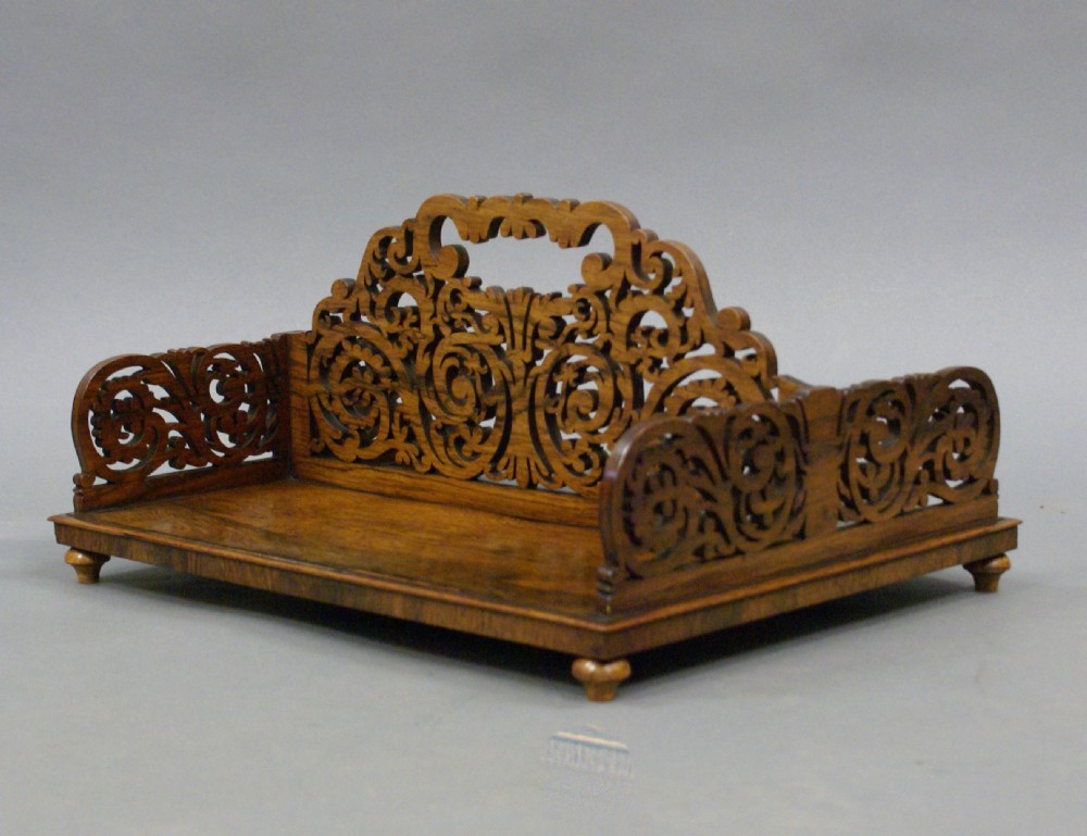 A superb fretted rosewood book carrier View III