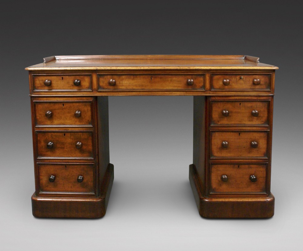 An attractive mahogany pedestal desk