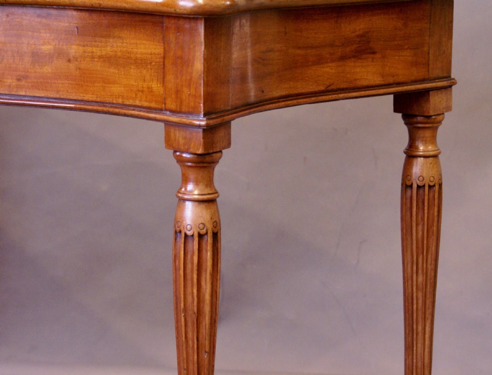 A Hepplewhite period serpentine card table View II