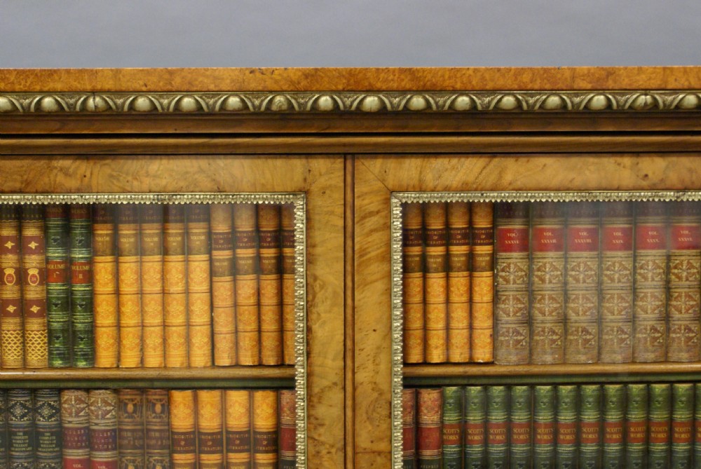 An exceptional walnut and ormolu side cabinet View III