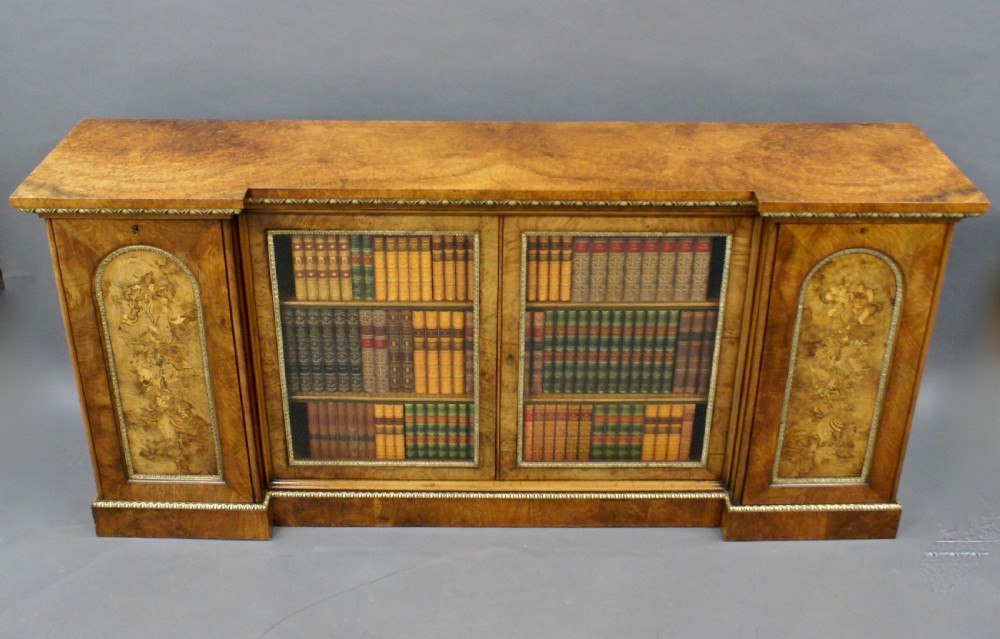 An exceptional walnut and ormolu side cabinet View V