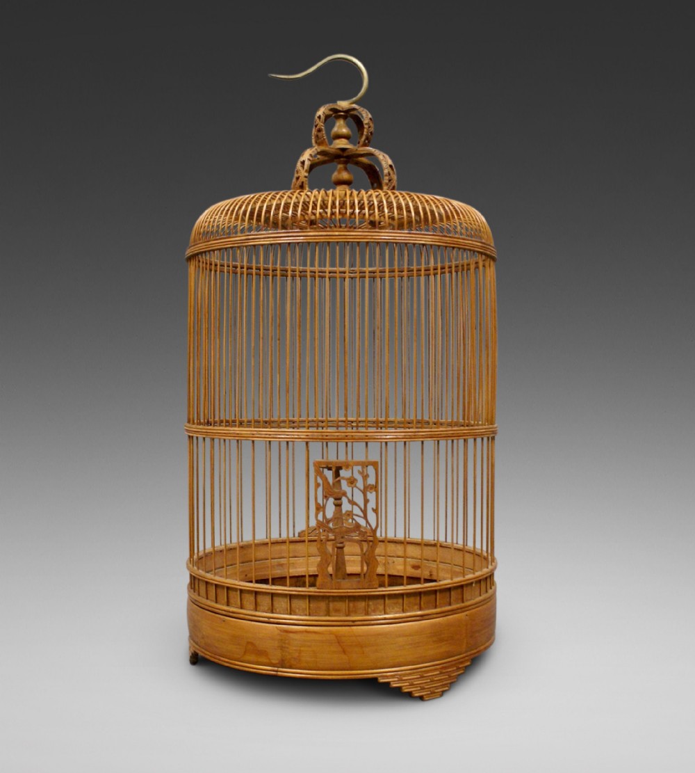 A decorative bamboo bird cage