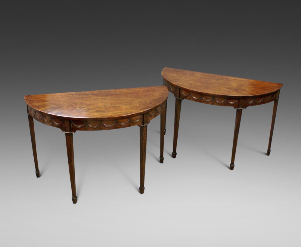 A fine pair of Adam period console tables View II
