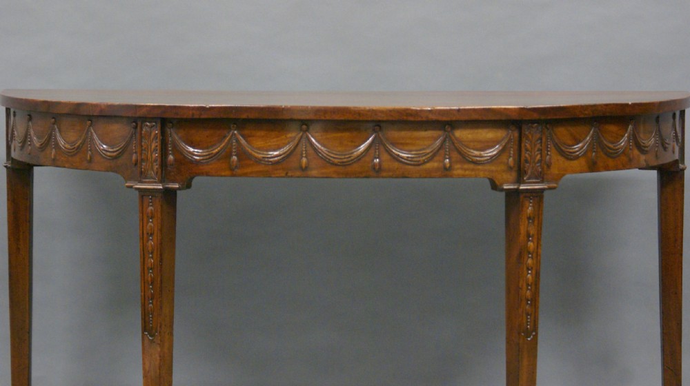 A fine pair of Adam period console tables View V