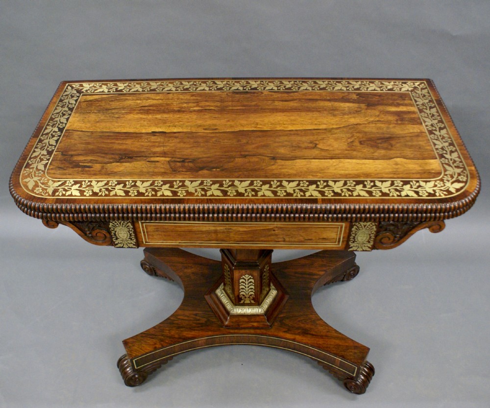 A Regency rosewood & brass inlaid card table View IV