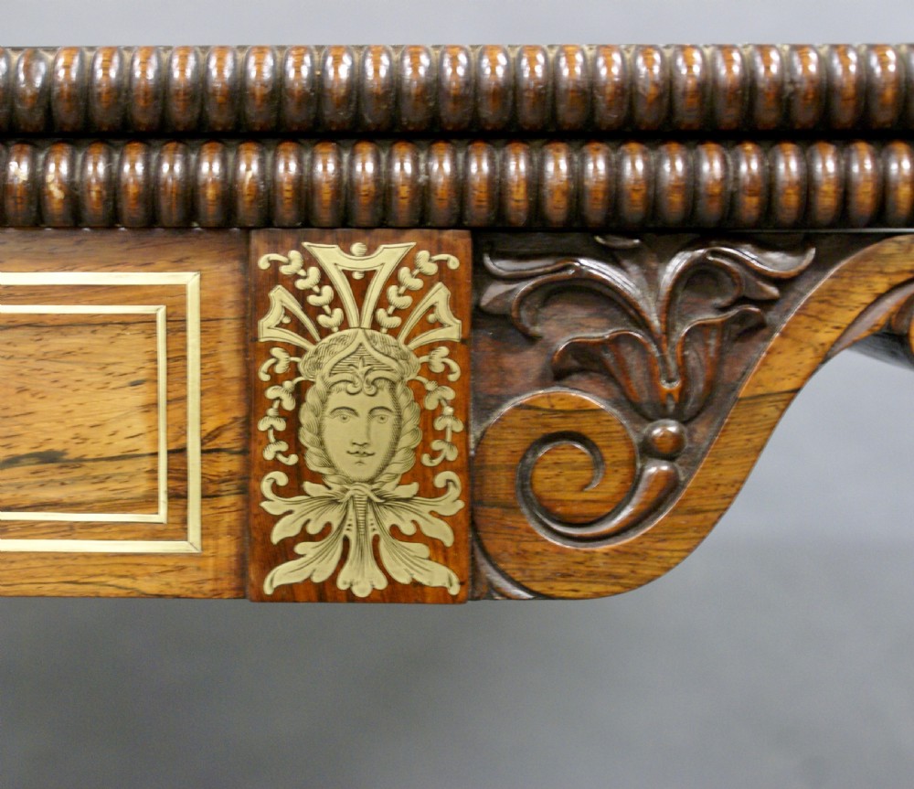 A Regency rosewood & brass inlaid card table View V