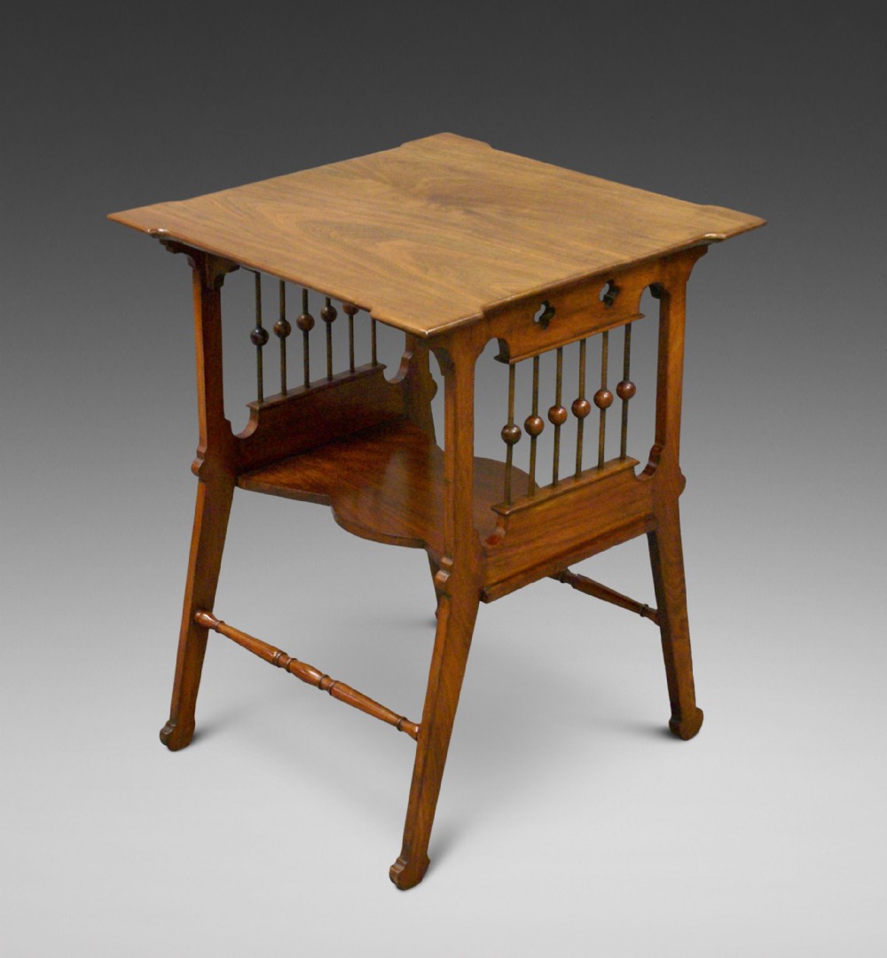An Aesthetic Movement walnut table