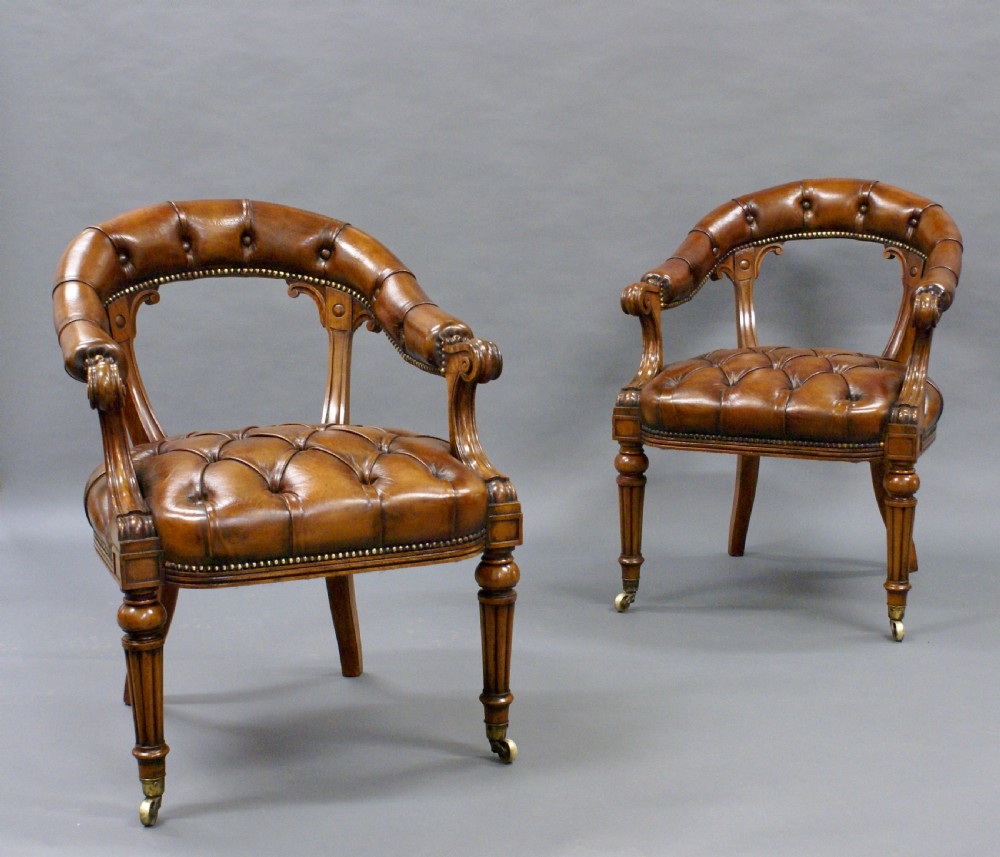 A fine pair of walnut library arm chairs View V