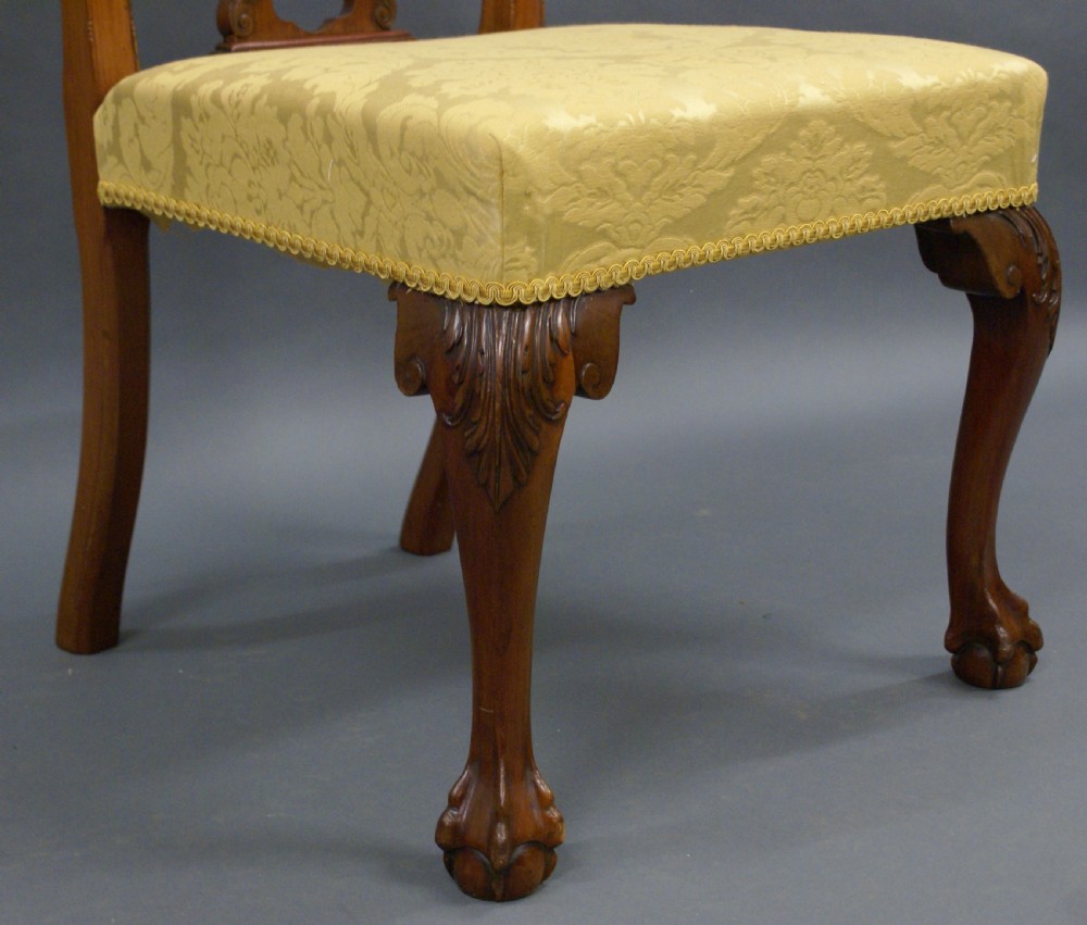 A superb set of 10 dining chairs View VI