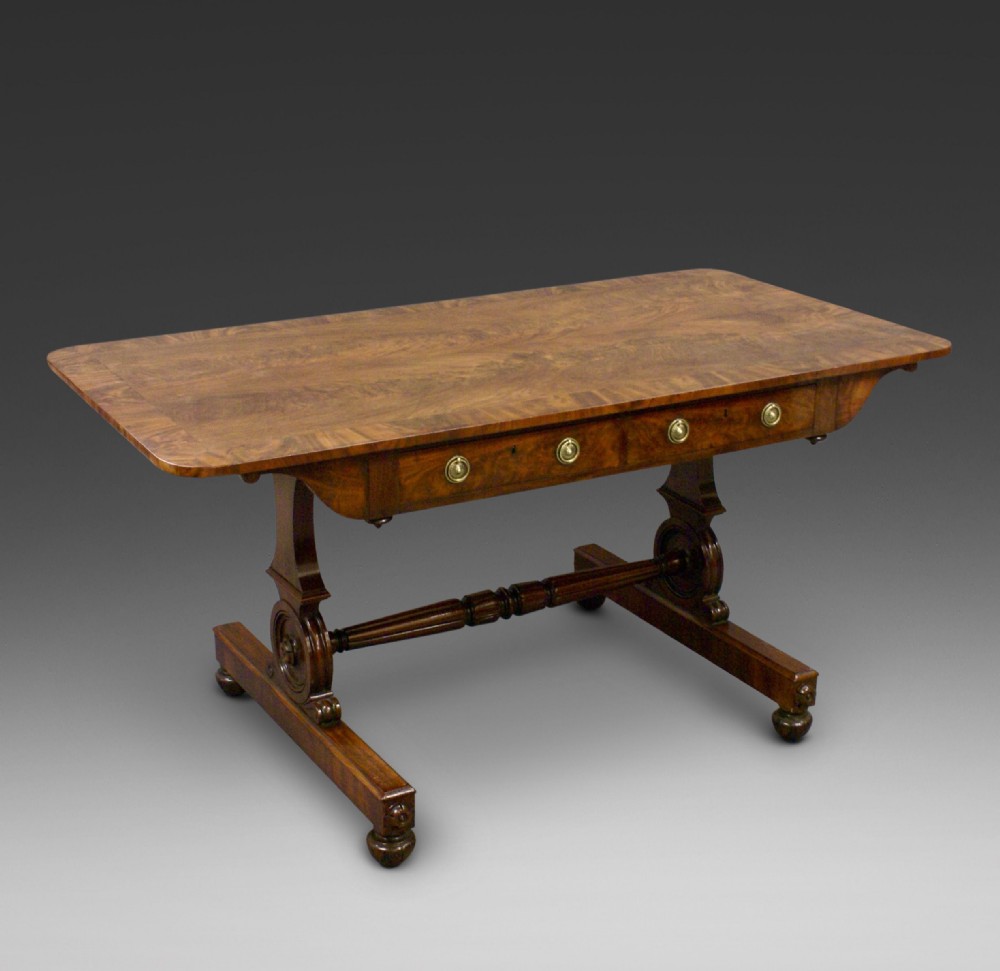 A flame mahogany sofa table