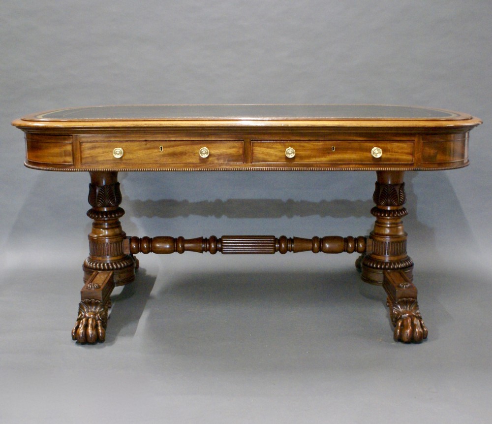A superb library writing table by Gillows View III