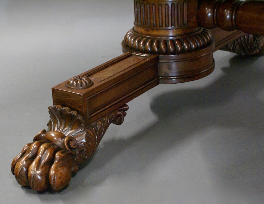 A superb library writing table by Gillows View VI