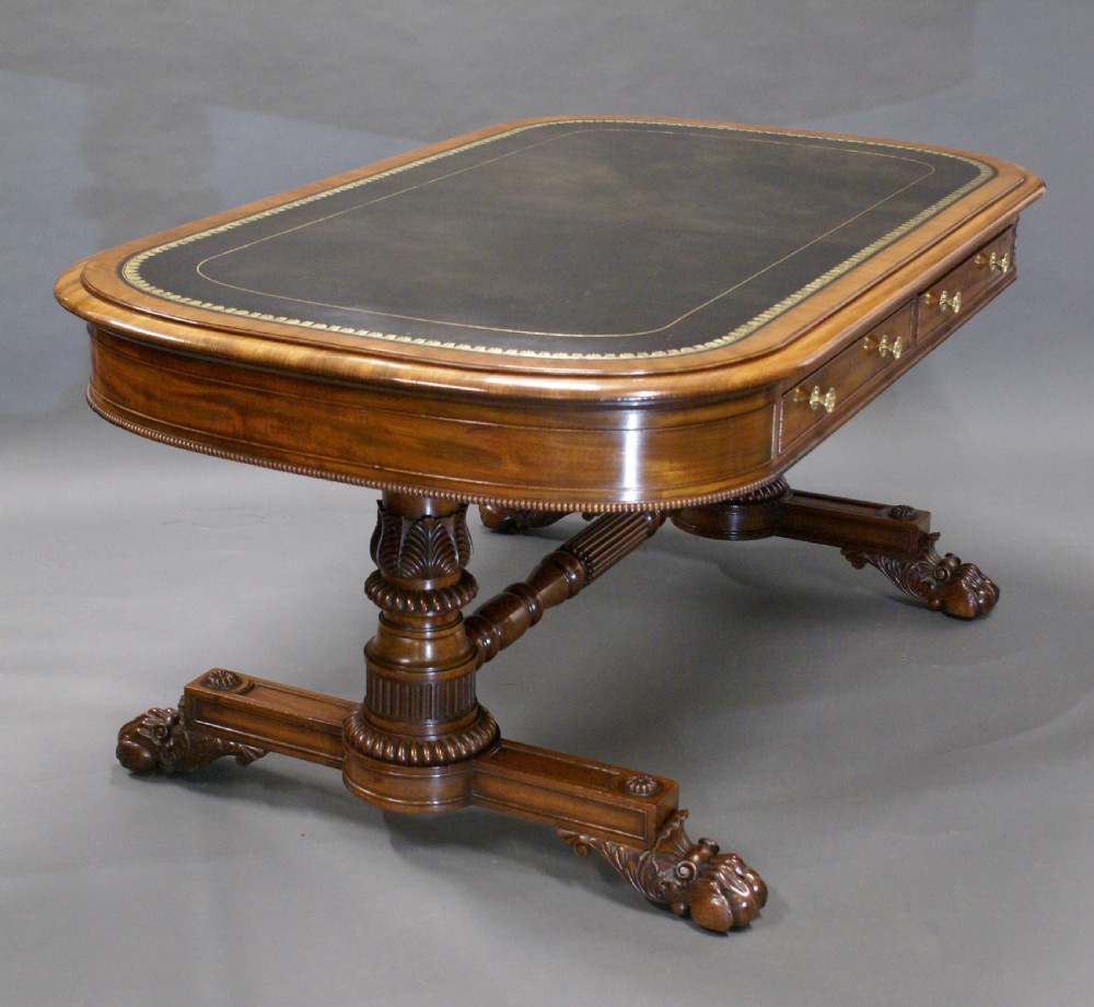 A superb library writing table by Gillows View VIII