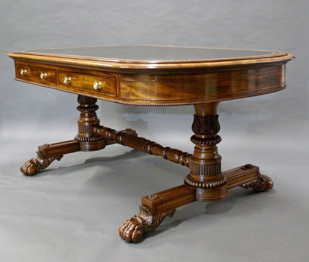 A superb library writing table by Gillows View X