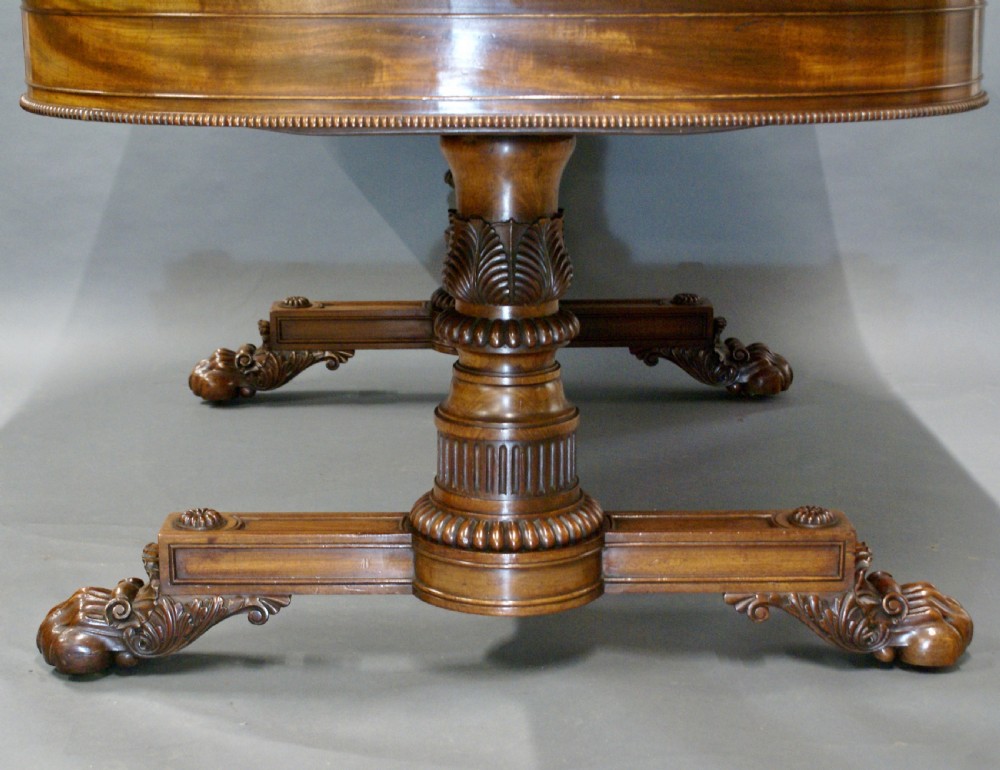 A superb library writing table by Gillows View XI