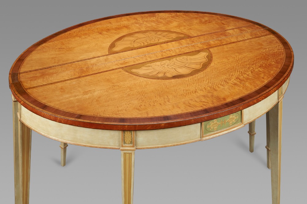 A large pair of satinwood & painted console tables View II