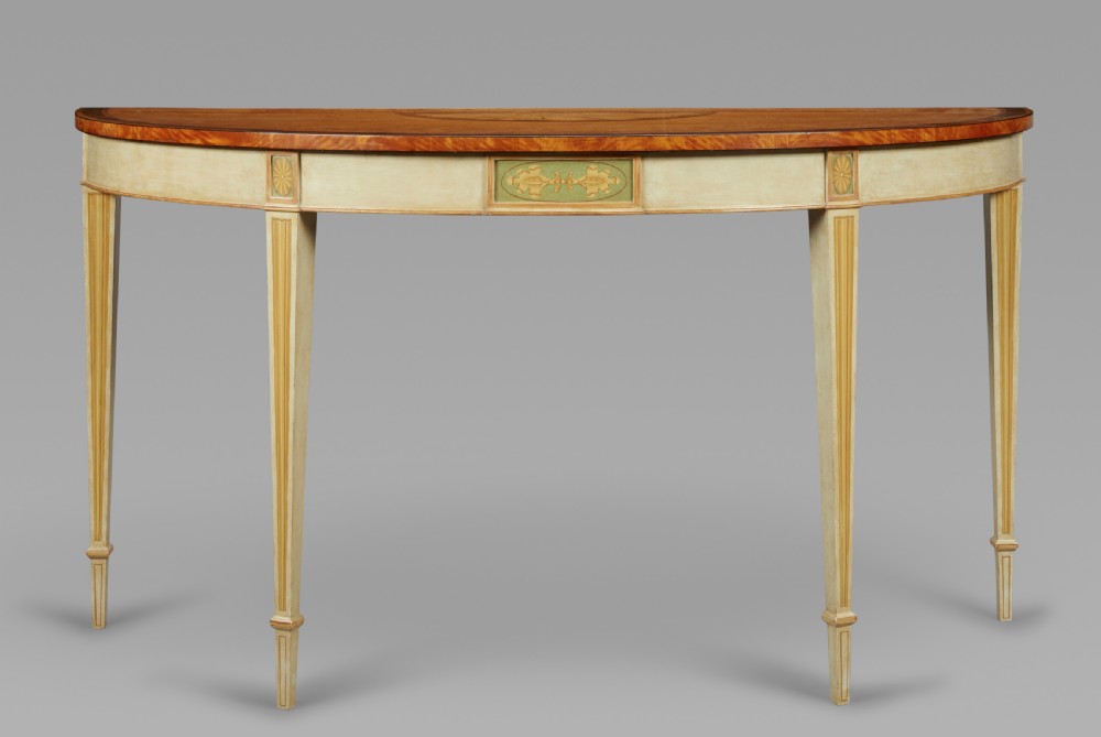 A large pair of satinwood & painted console tables View III