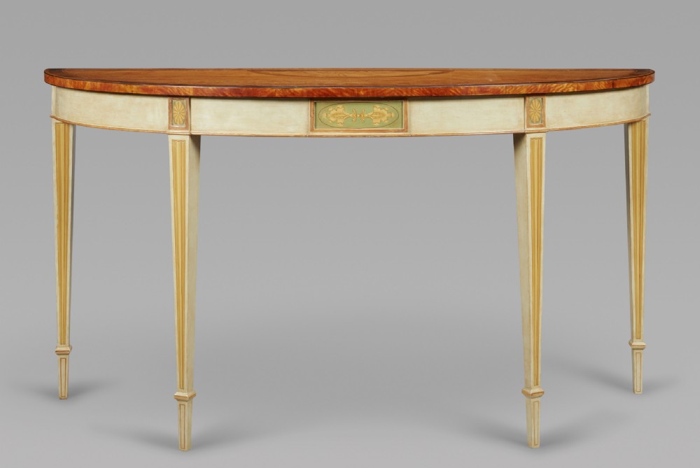 A large pair of satinwood & painted console tables View V