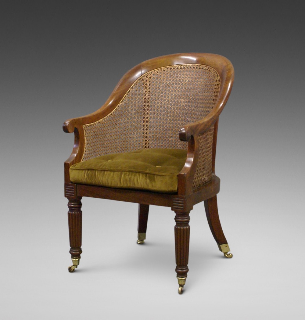 A Regency mahogany bergere chair