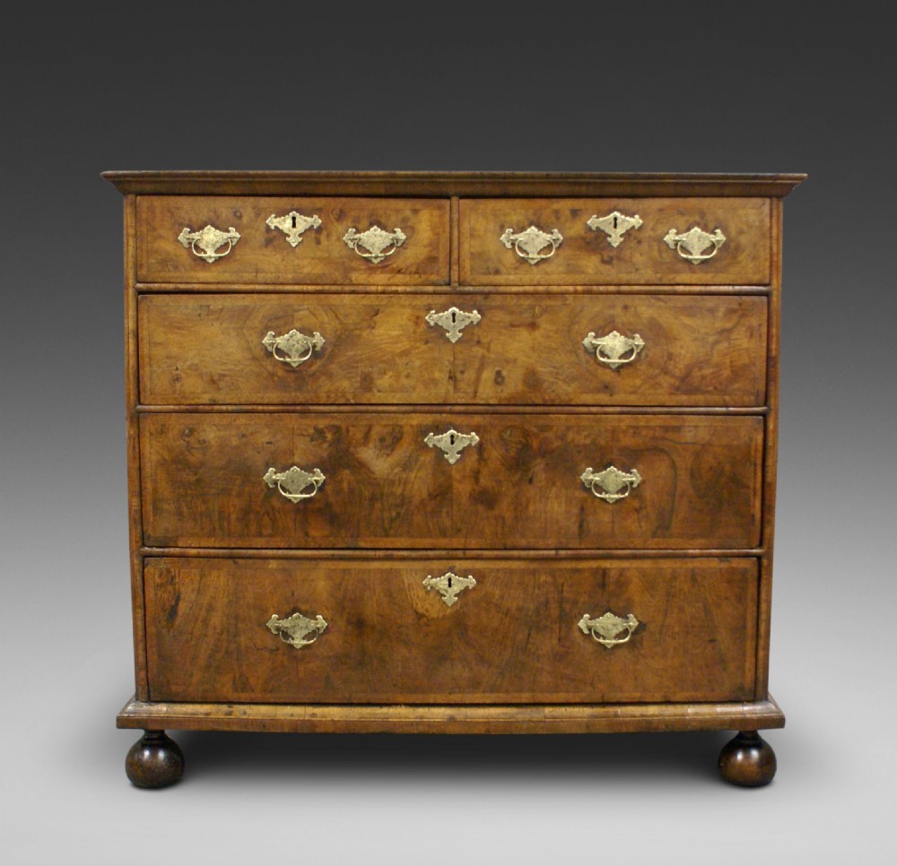 A William & Mary walnut chest of drawers