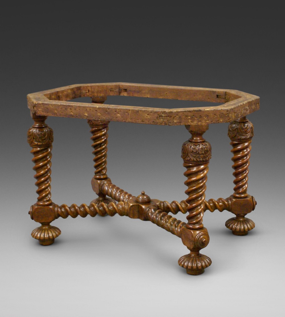 A 19th century walnut stool