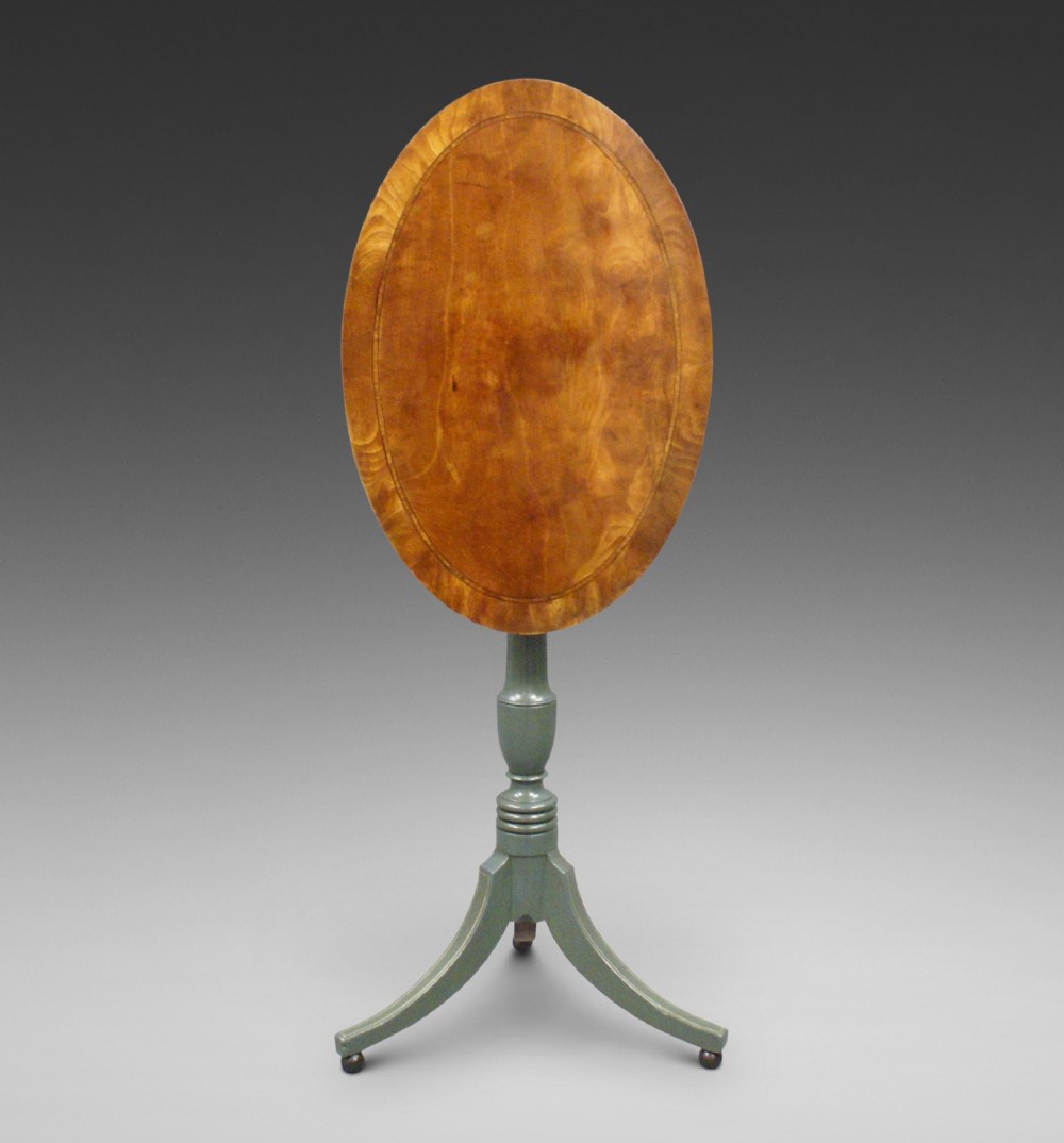 A satinwood and paint decorated tripod table