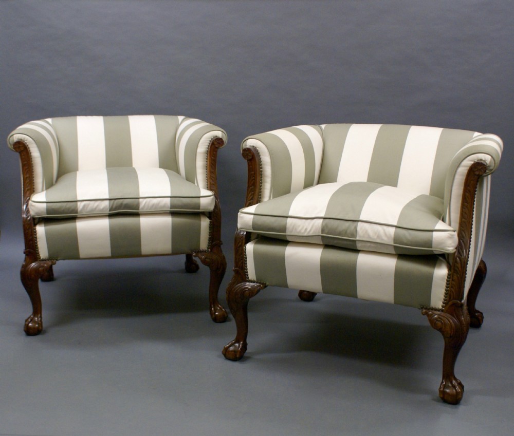 An impressive pair of Edwardian mahogany arm chairs View IV