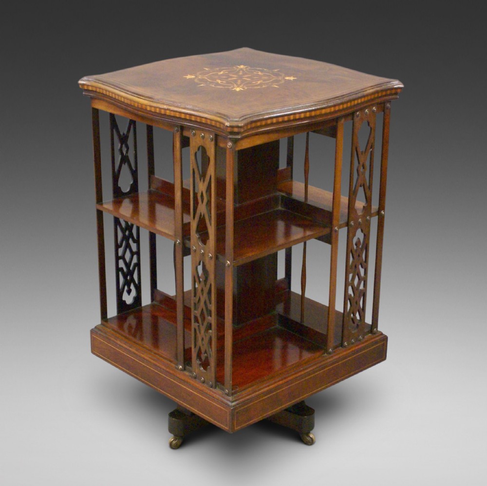 A fine quality inlaid revolving bookcase