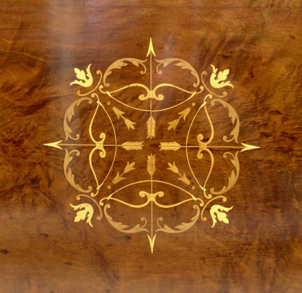 A fine quality inlaid revolving bookcase View V