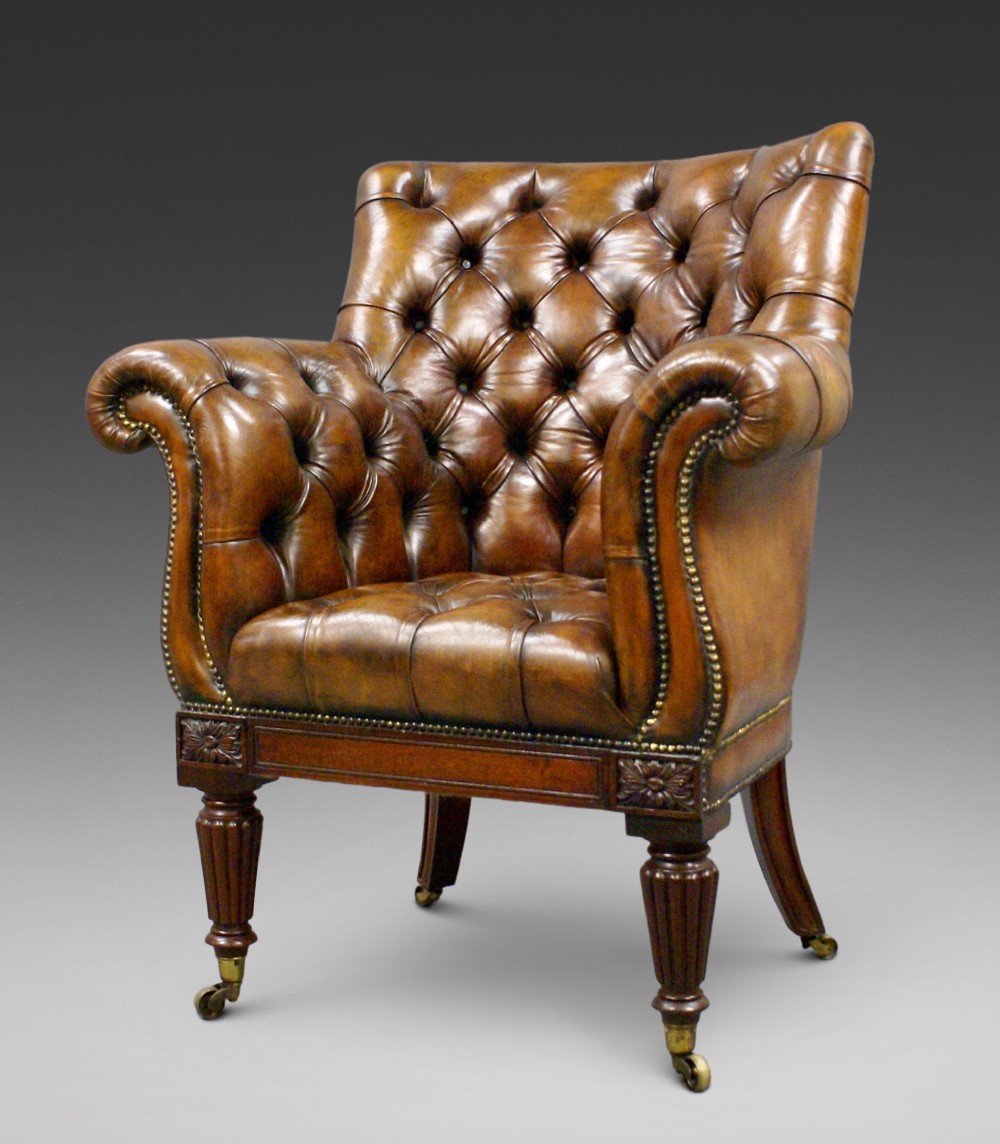 An impressive Regency library arm chair