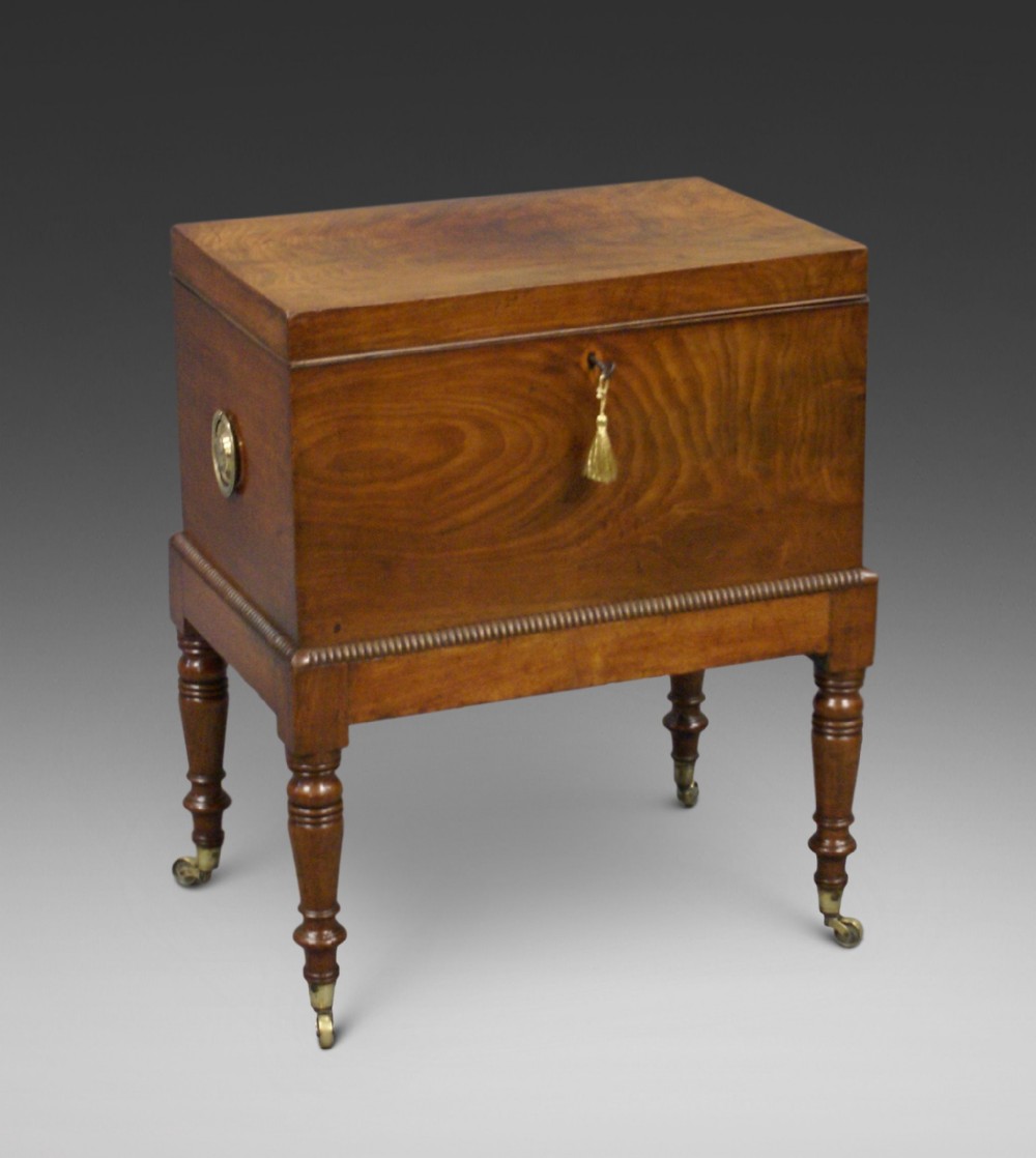 A late Regency flame mahogany cellarette