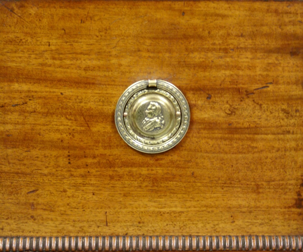 A late Regency flame mahogany cellarette View IV