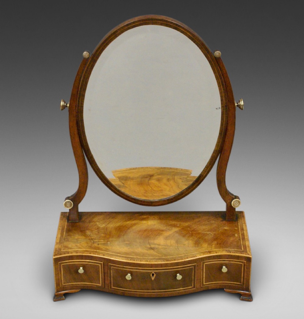 A George III mahogany toilet mirror
