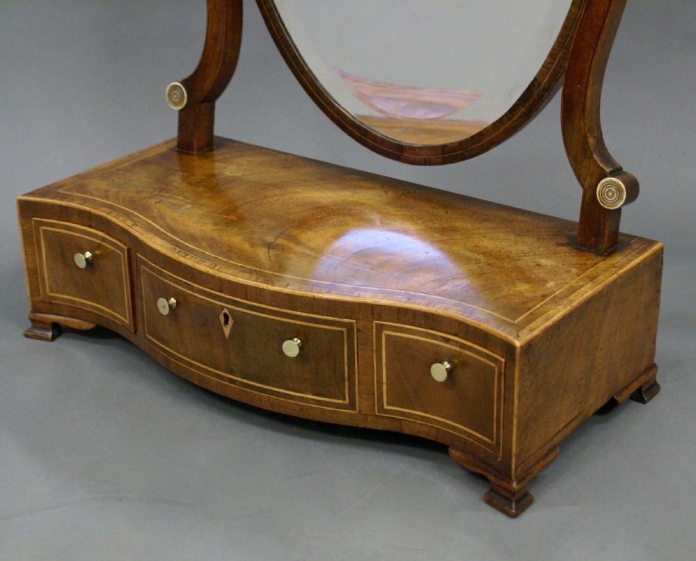 A George III mahogany toilet mirror View IV