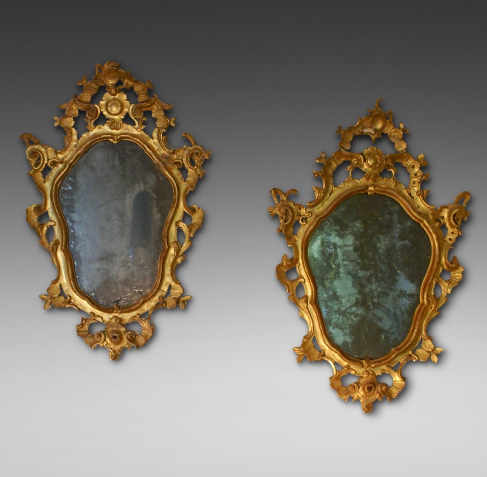 A matched pair of mid 18th century Italian mirrors