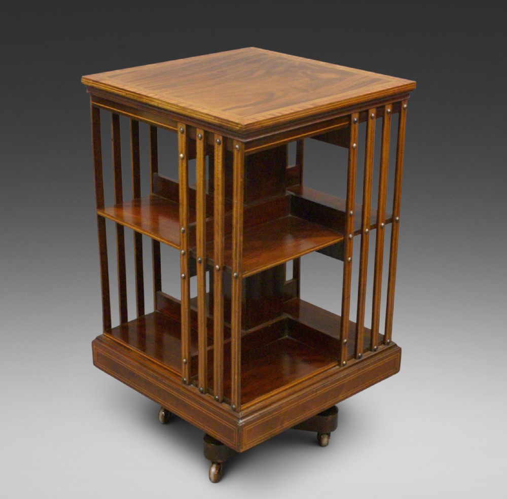 A mahogany iron base revolving Bookcase