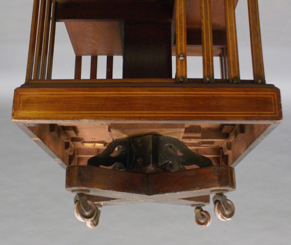 A mahogany iron base revolving Bookcase View IV