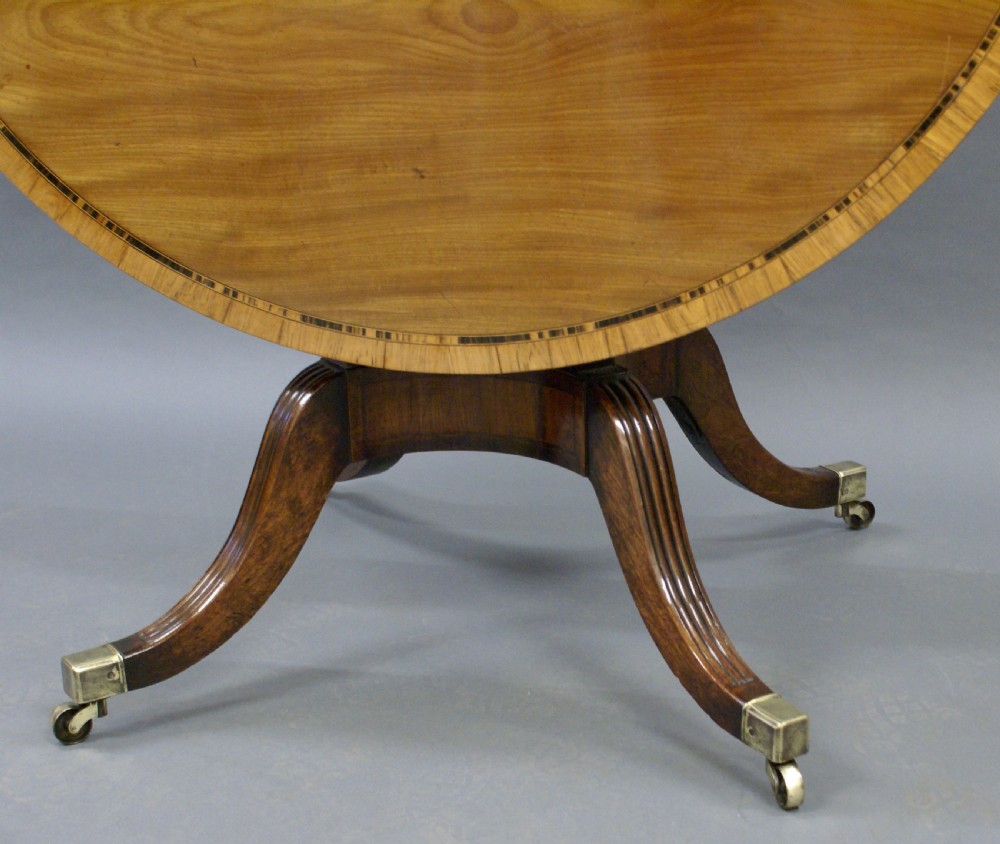 A Regency mahogany and corromandle centre table View III