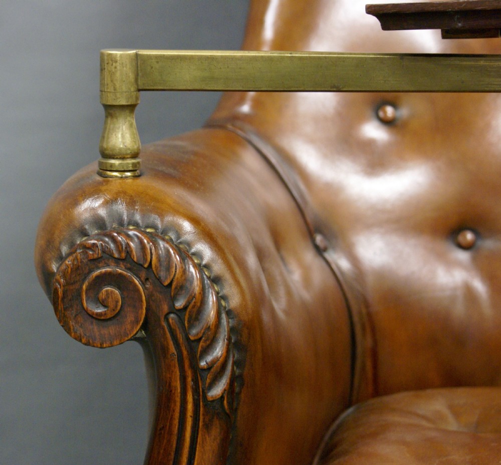 A Regency leather upholstered reading chair View III
