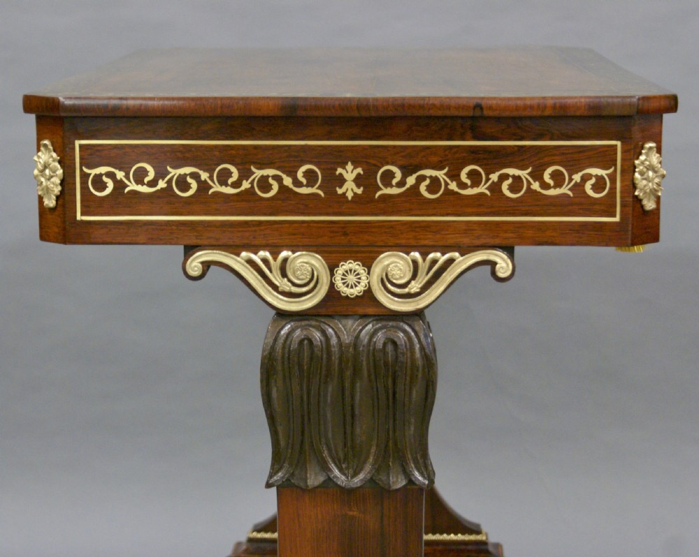 An exceptional Regency brass inlaid rosewood table View V