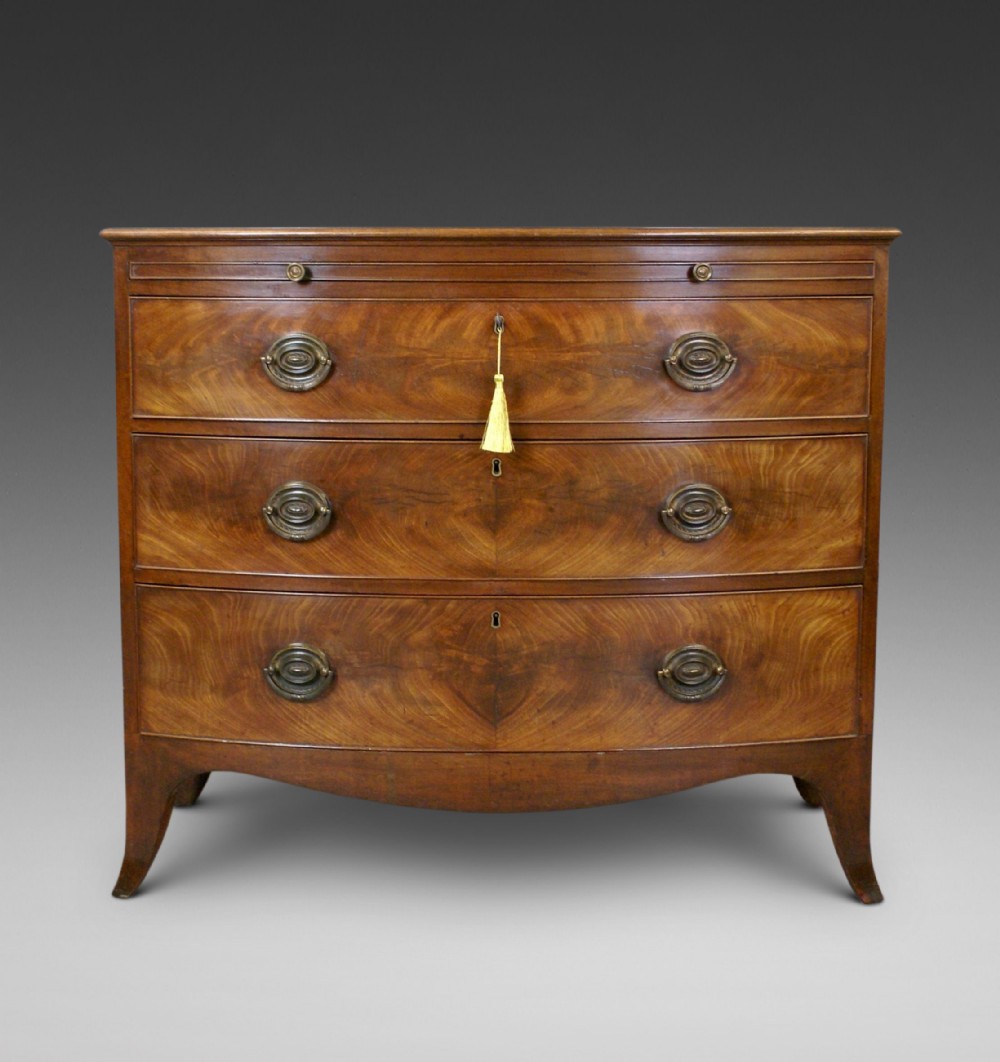 A fine George III bow-fronted chest