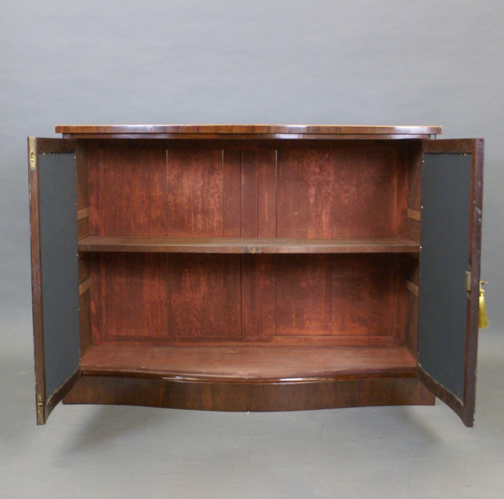A George III serpentine side cabinet View VI