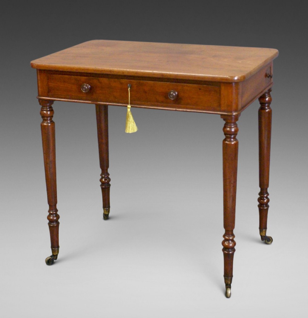 A chamber writing table attributed to Gillow