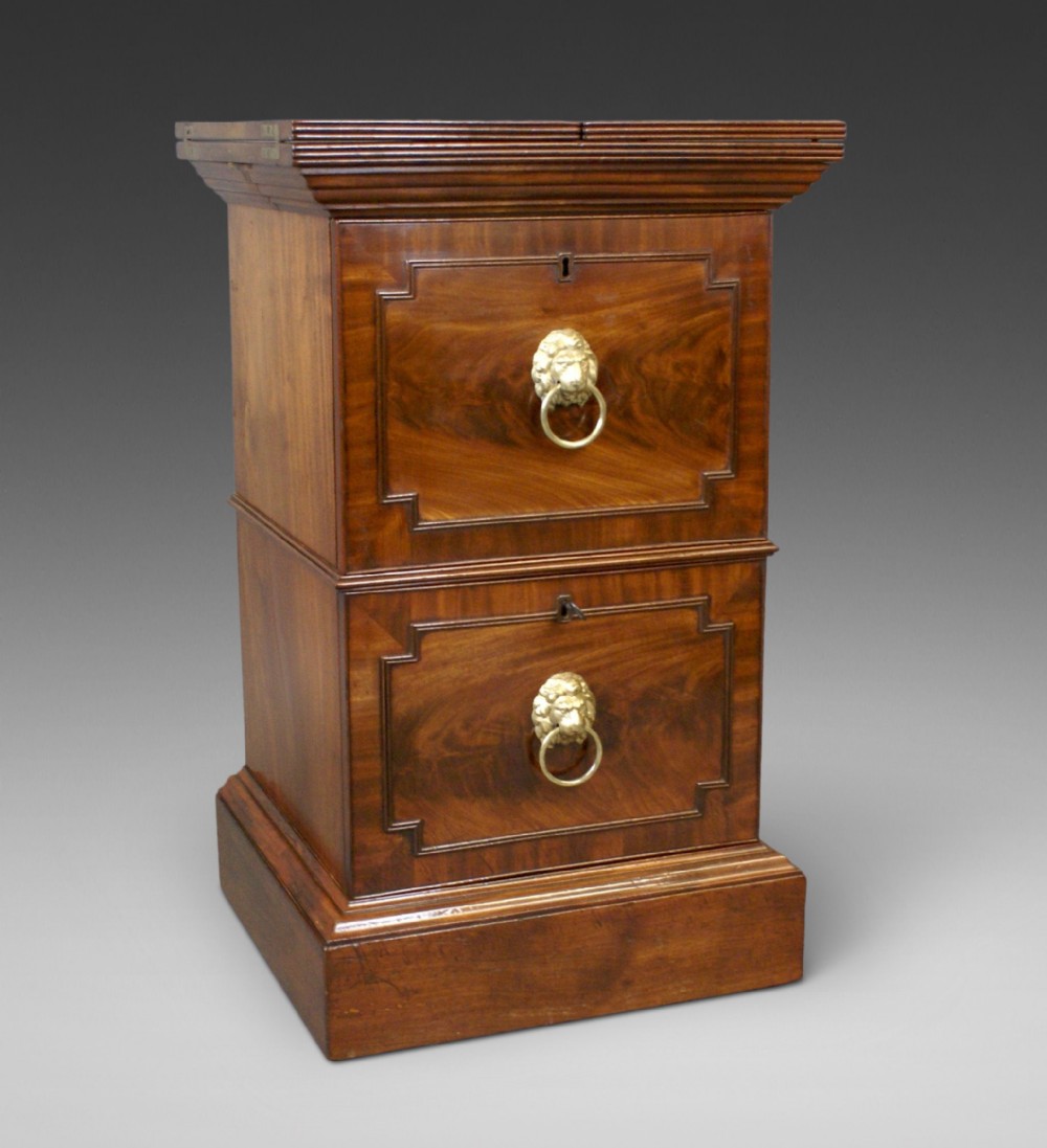 An unusual Regency pedestal celarette 