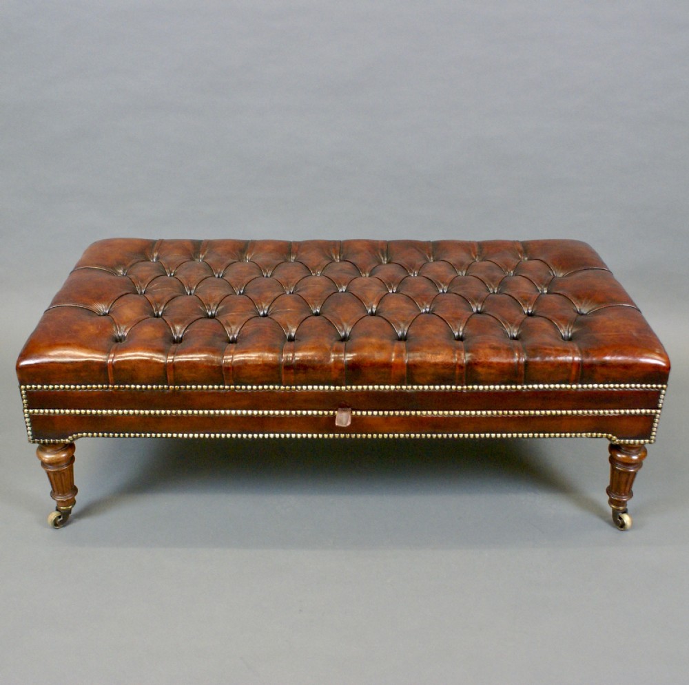 A large walnut & leather stool View V
