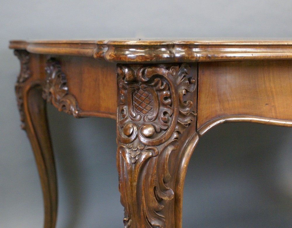 A large 19thC French walnut writing table View III